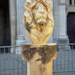 a lion carved out of wood