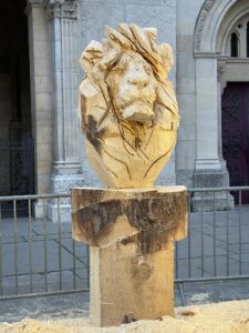 a lion carved out of wood