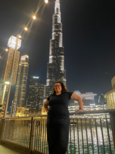 Hope standing in front of the Burj Khalifa